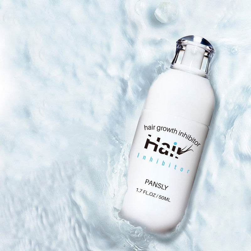 A white 100ml PANSLY Hair Removal Cream bottle rests on a wet surface with water ripples, emphasizing its plant-based formula for silky-smooth skin.